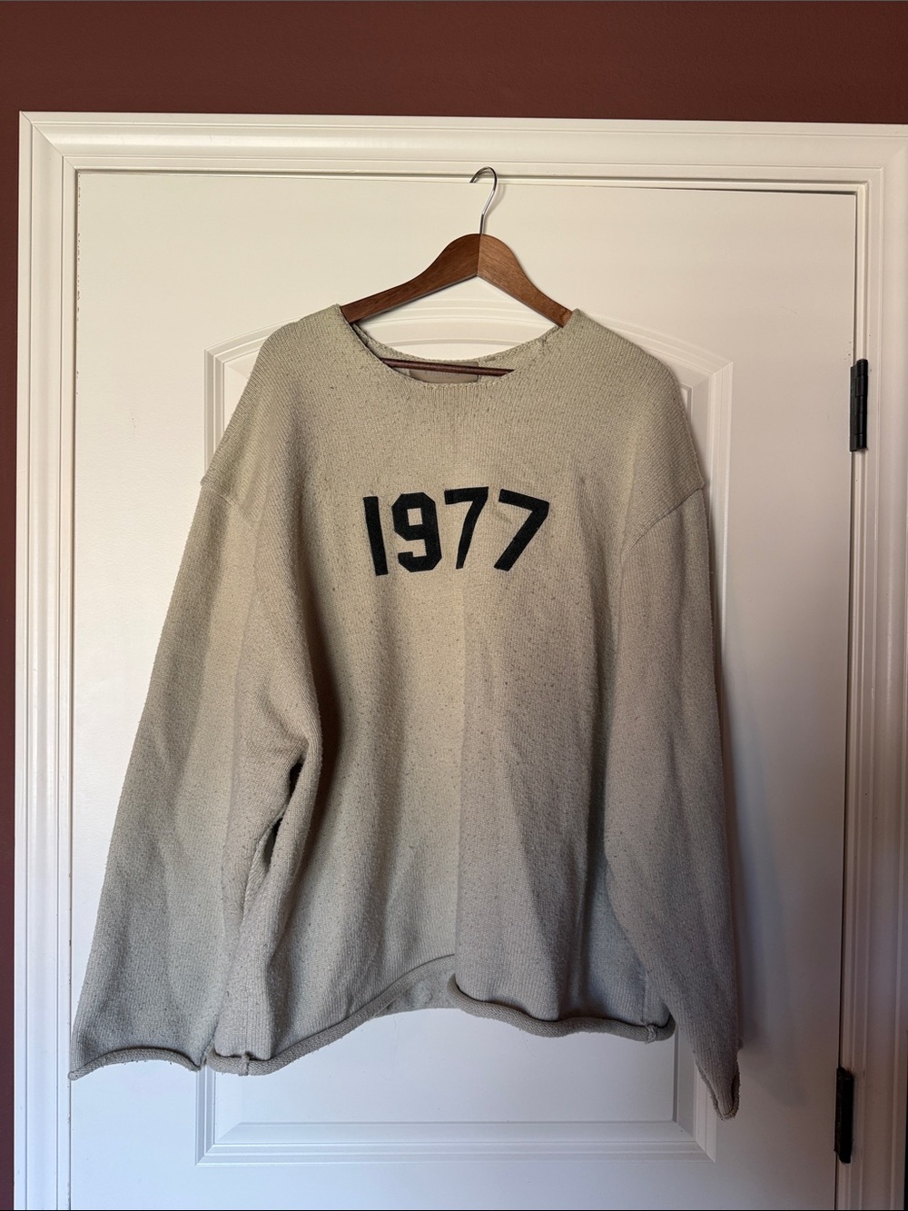Essentials Cream Crewneck Sweater with Black 1977 Graphic
